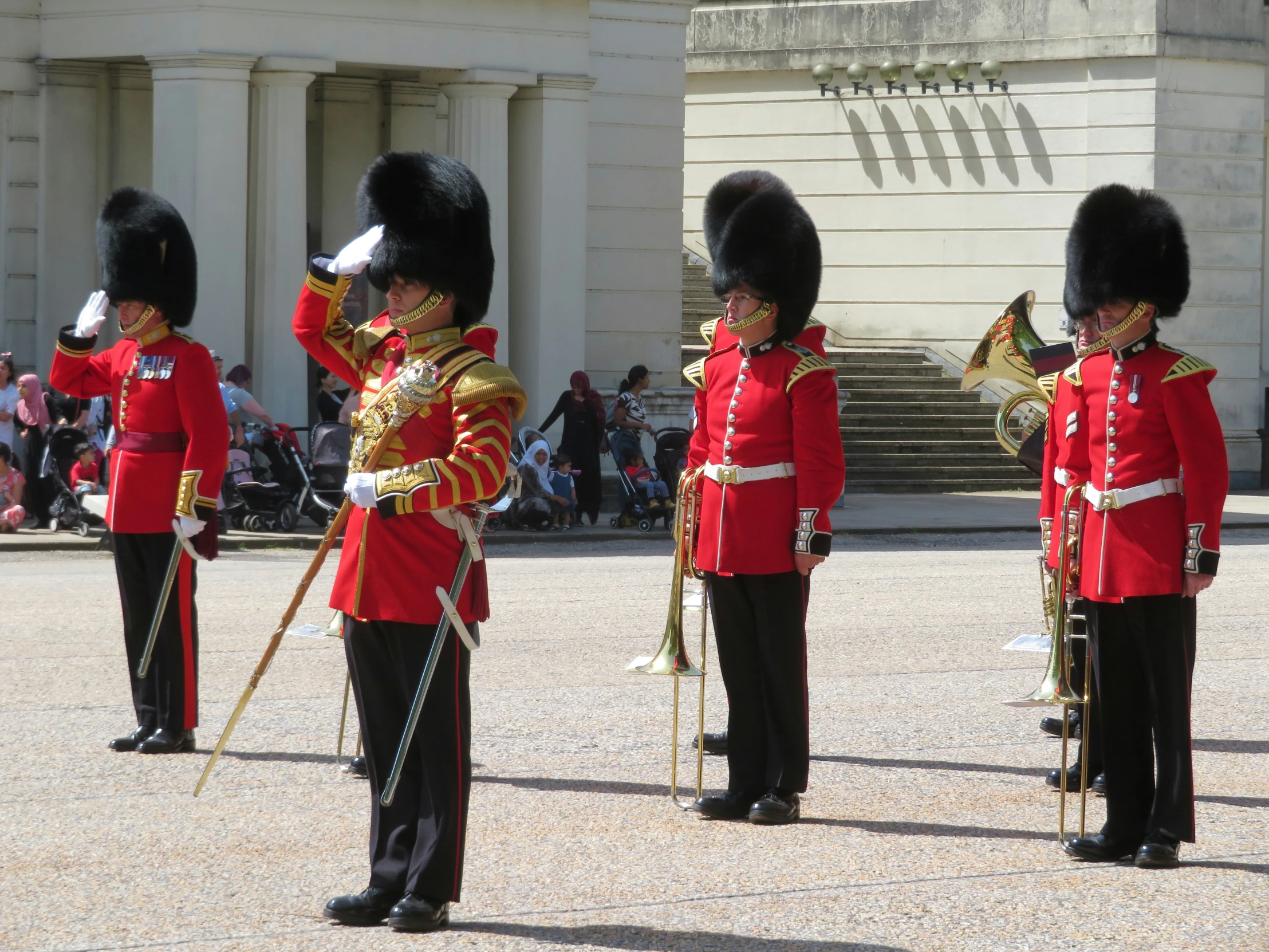 the soldiers are wearing their royal uniforms