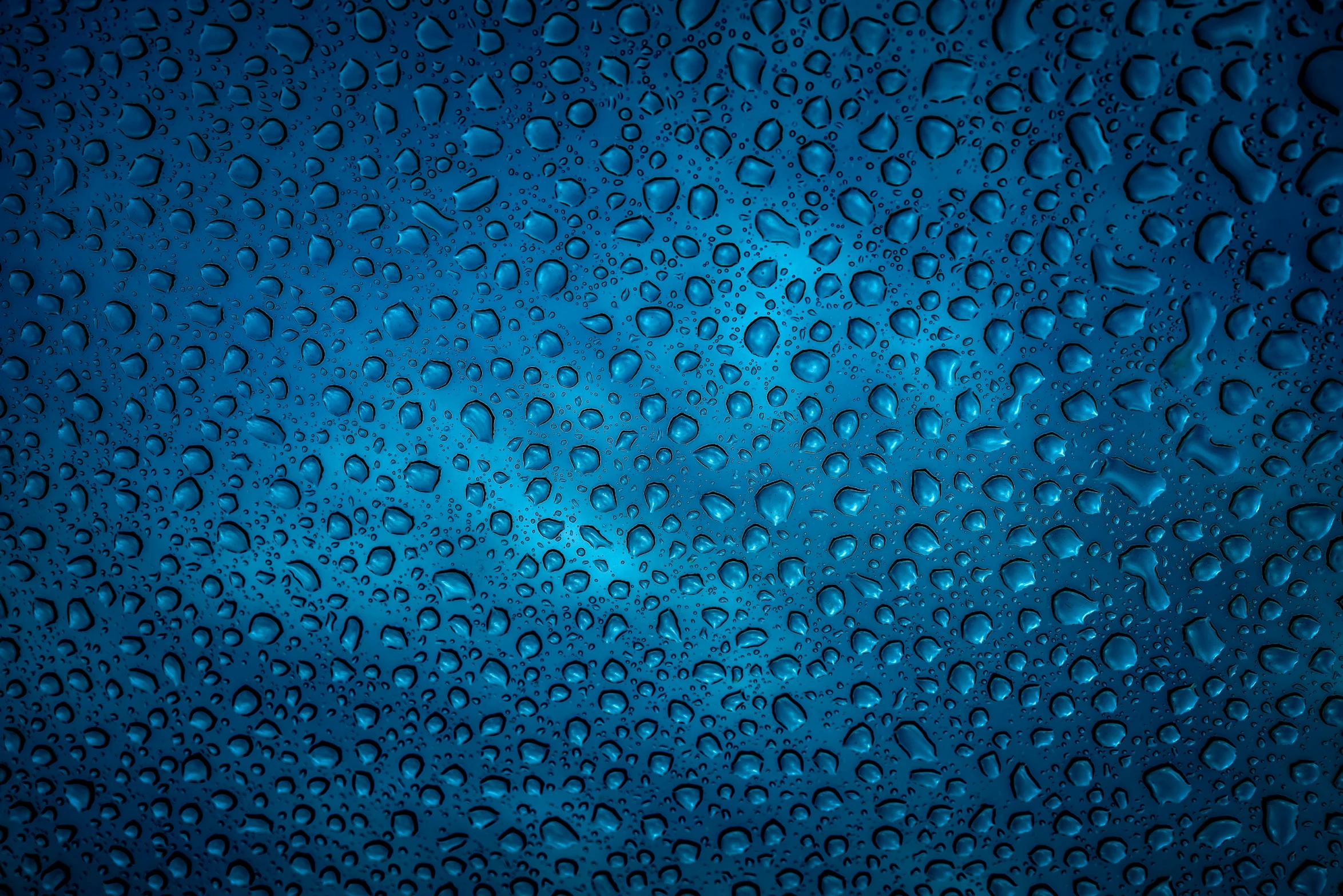 drops of rain on a window or a surface