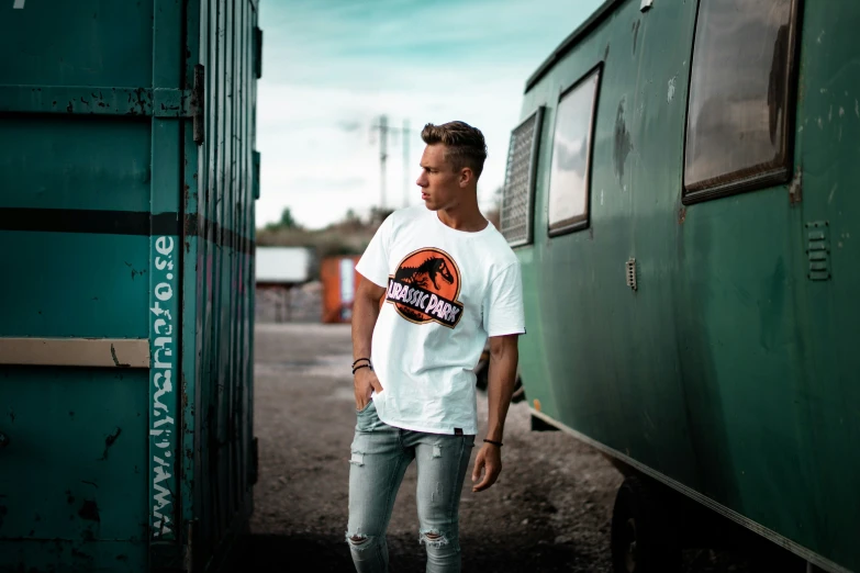 a man is standing in front of a train