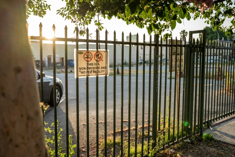 a sign on a fence saying no to bicycle riders