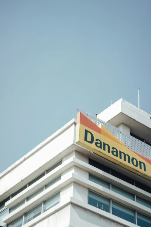 a large billboard for dannann sitting on top of a tall building