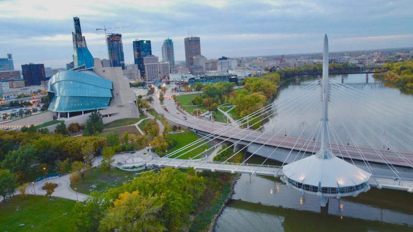 an aerial view of a bridge and a city