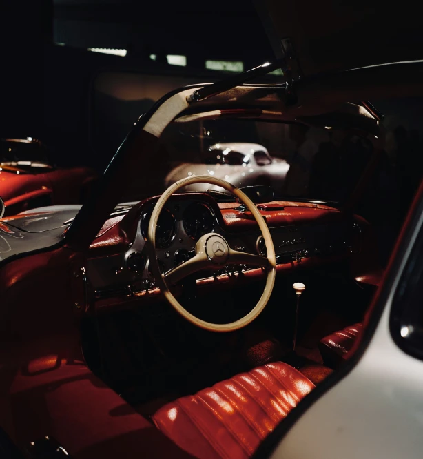 the view from the inside of a car with the steering wheel and dashboard showing