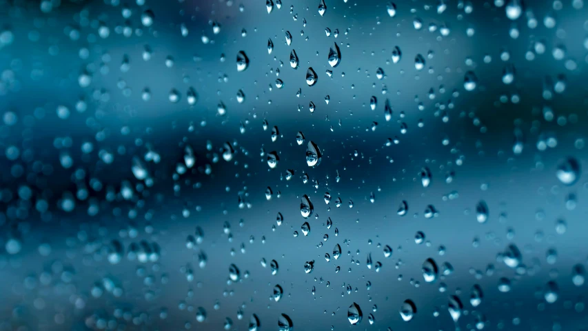 rain drops on glass and the view from outside