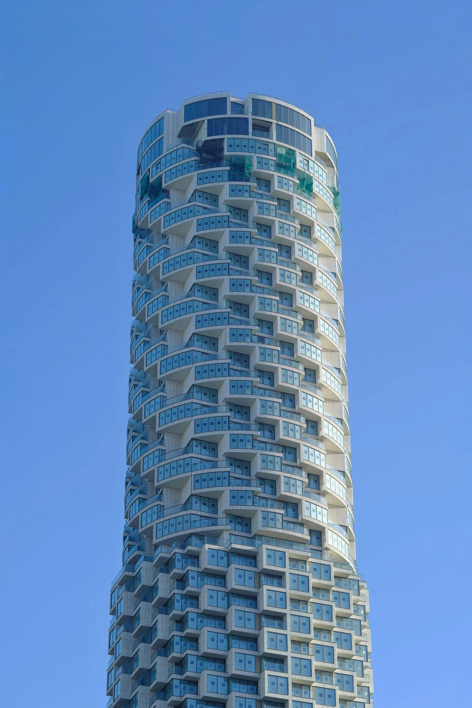 the tower has balconies for all kinds of windows