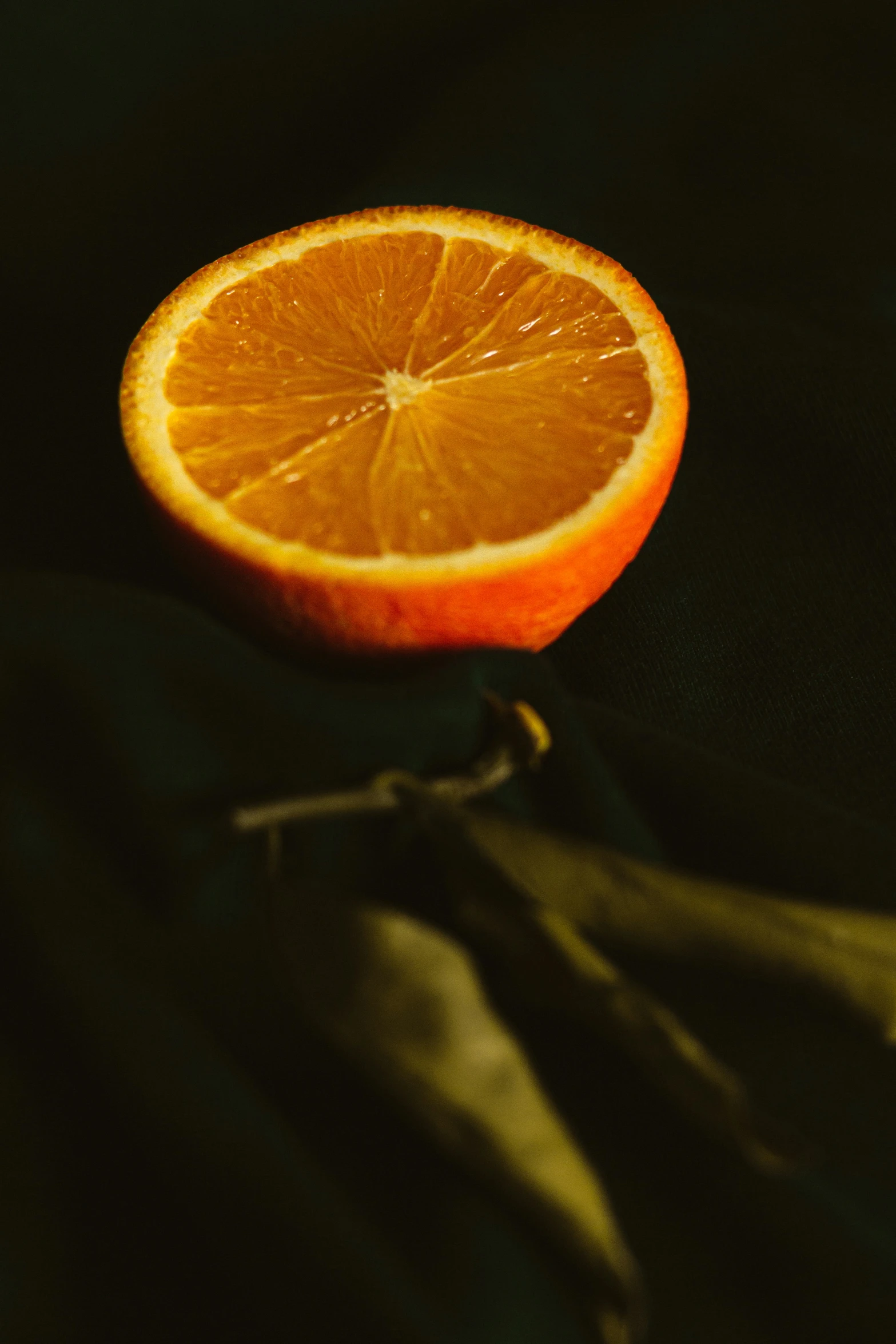 the orange is half of it, which has been peeled