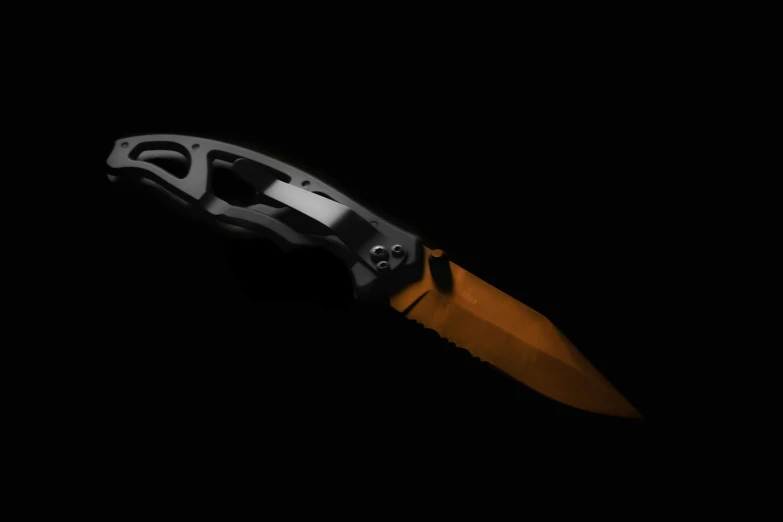 a knife with an orange blade in a black background