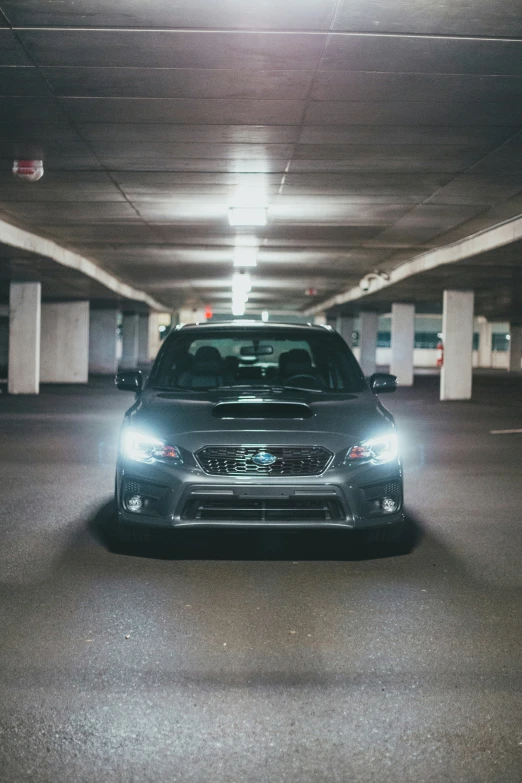 an image of a car going through a parking garage