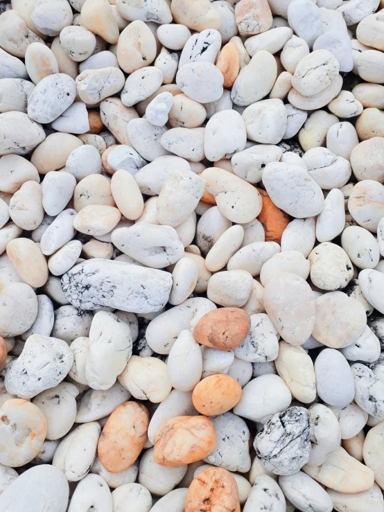 various colors of pebbles in small pile