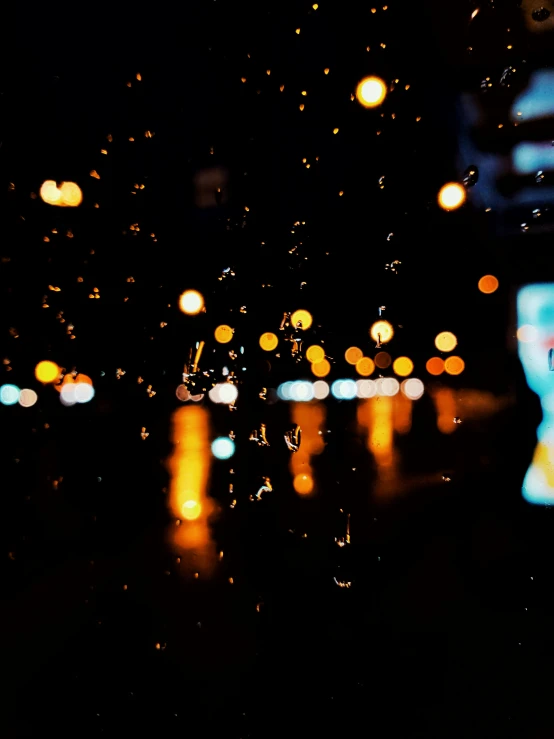 view from inside an automobile on a rainy night