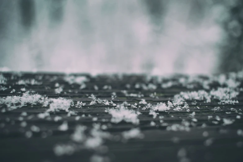 water splashing against an umbrella on an overcast day