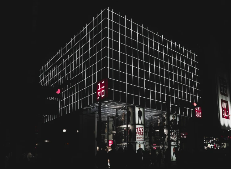 this is an image of a modern office building at night