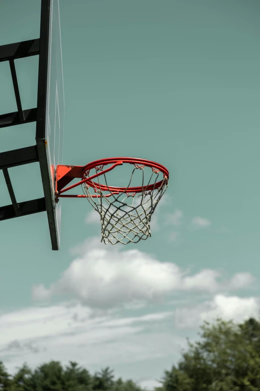 a basketball hoop attached to a building's backboard