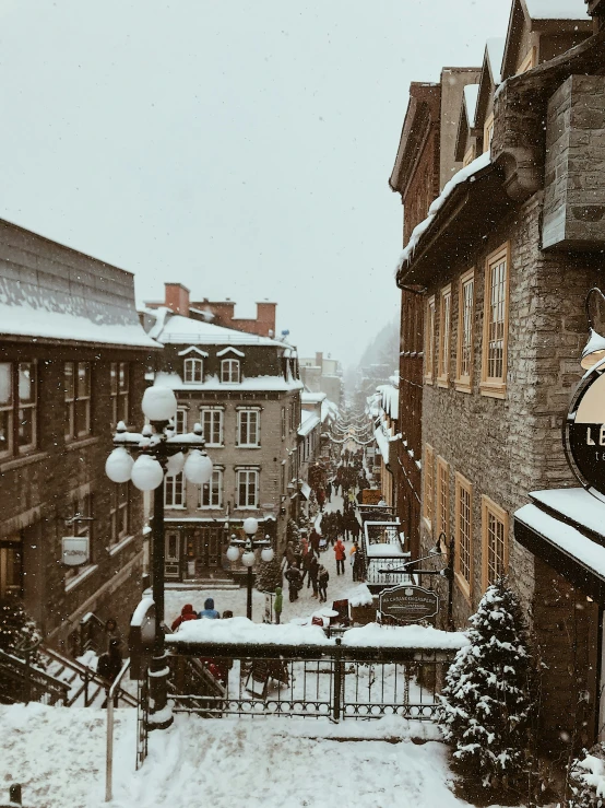 the view from a building looking down at the street