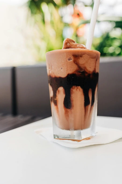 there is ice cream and whipped coffee in a glass