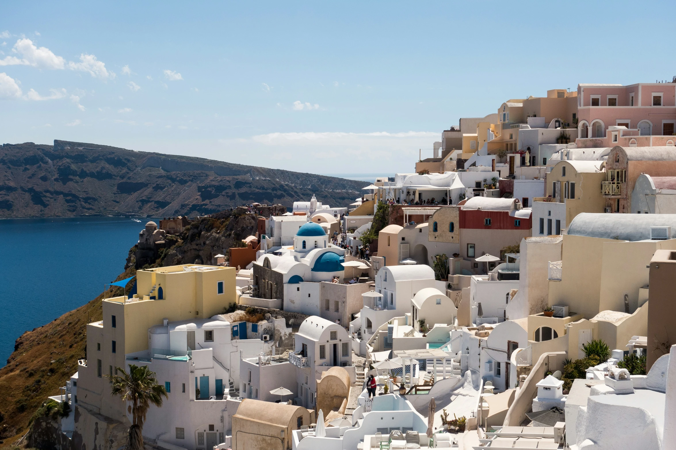 an aerial view of a city on the beach