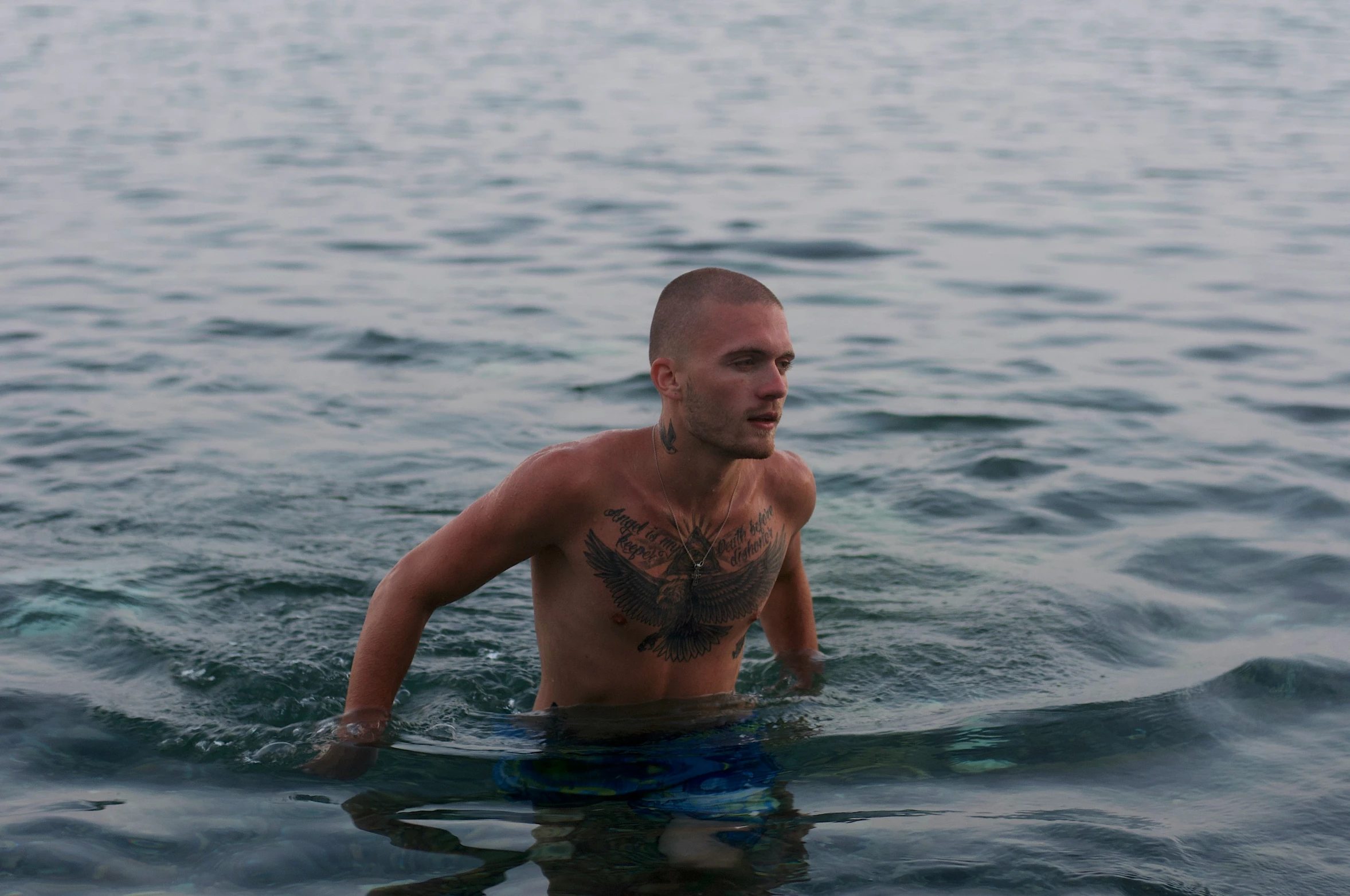 a man swimming alone in the water