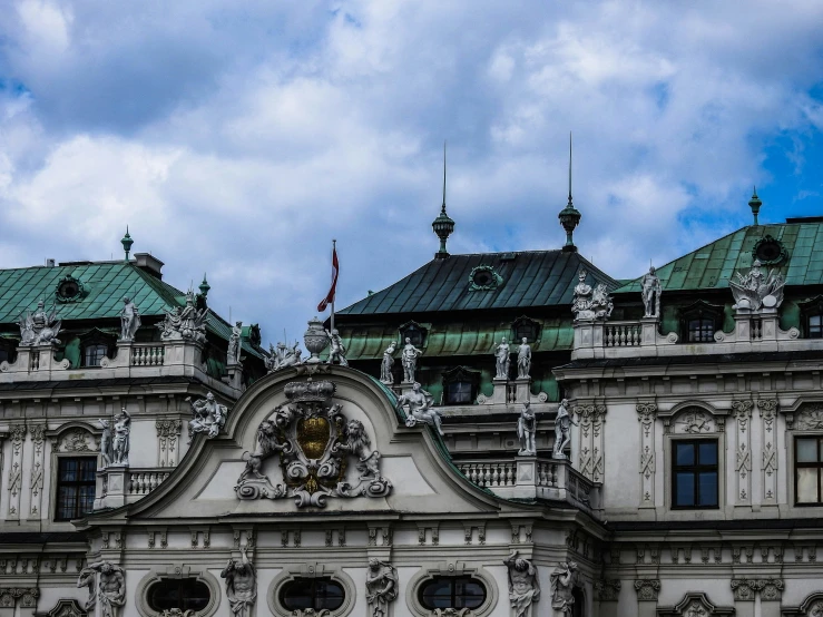 a beautiful building with an ornate clock tower on it's roof