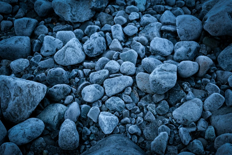 a very dark and icy day with rocks