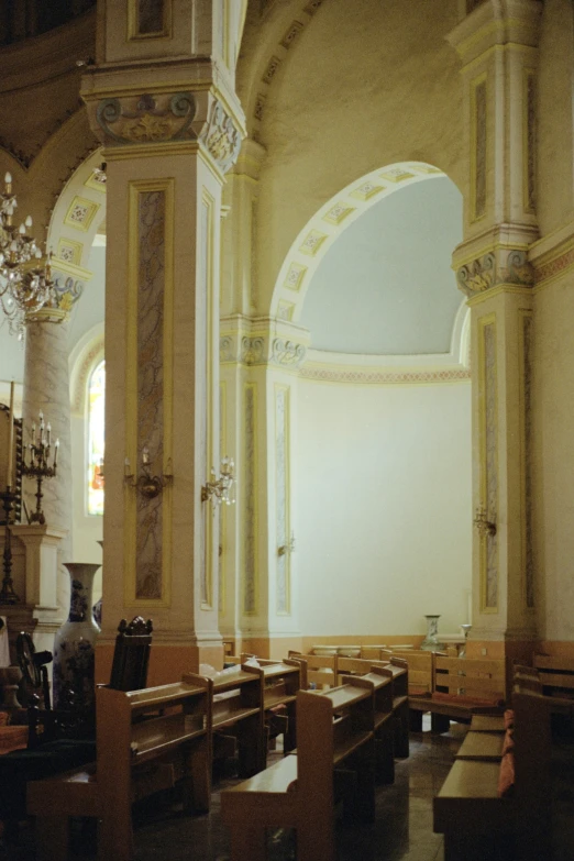 an empty room has a chandelier in it