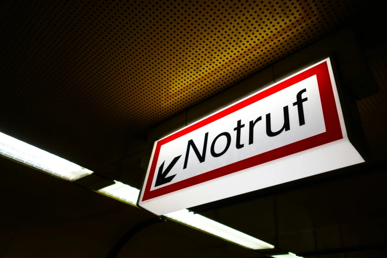 a red and white sign that says notruff