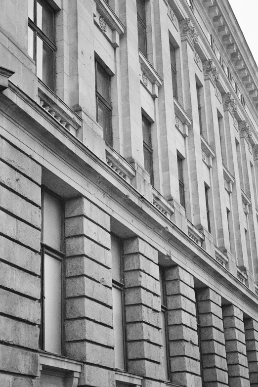 a large building with a long row of windows on it