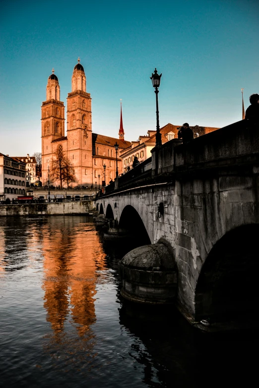 a bridge that is spanning across the river