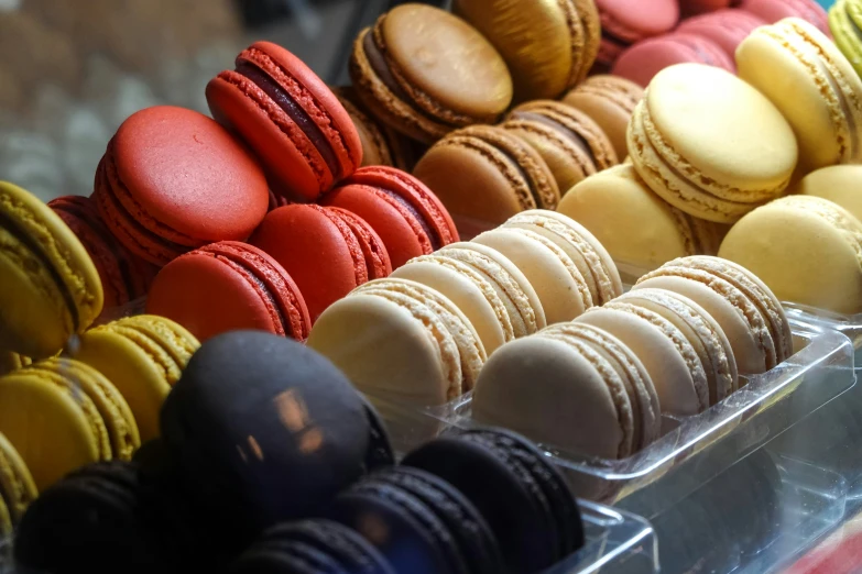 different colored and flavored macaroons on display
