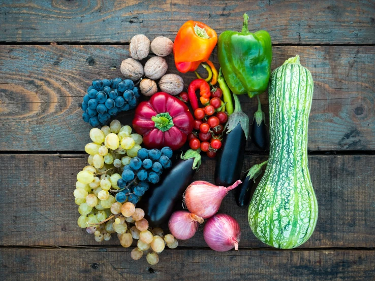 some fruits and vegetables are sitting on a table