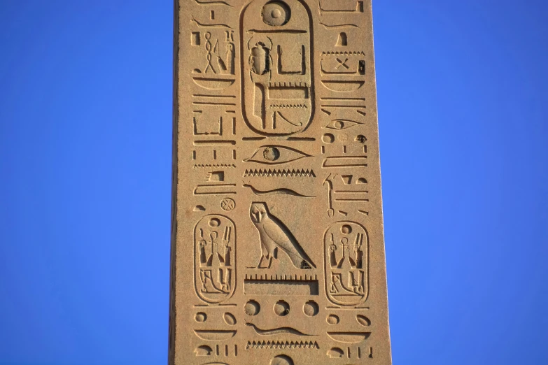 the large egyptian obelisk has pictures on it