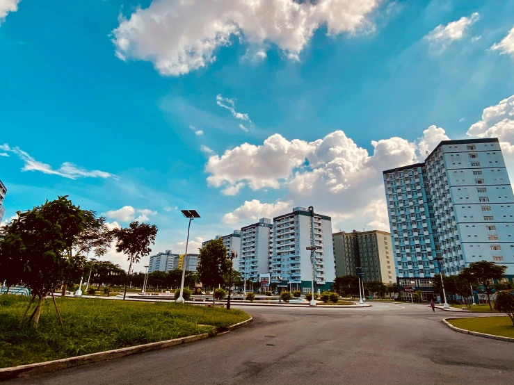 a view of a street in a city near some large buildings