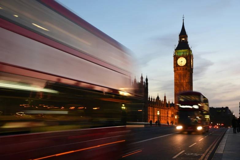 a tall clock tower towering over the city of london