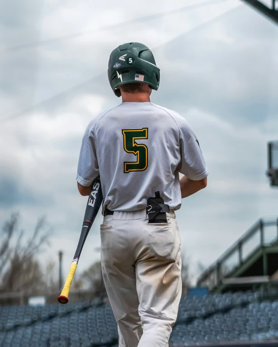 the baseball player is standing in his stance at bat