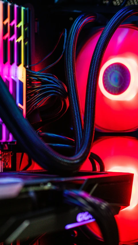 computer equipment including many colorful lights and wires