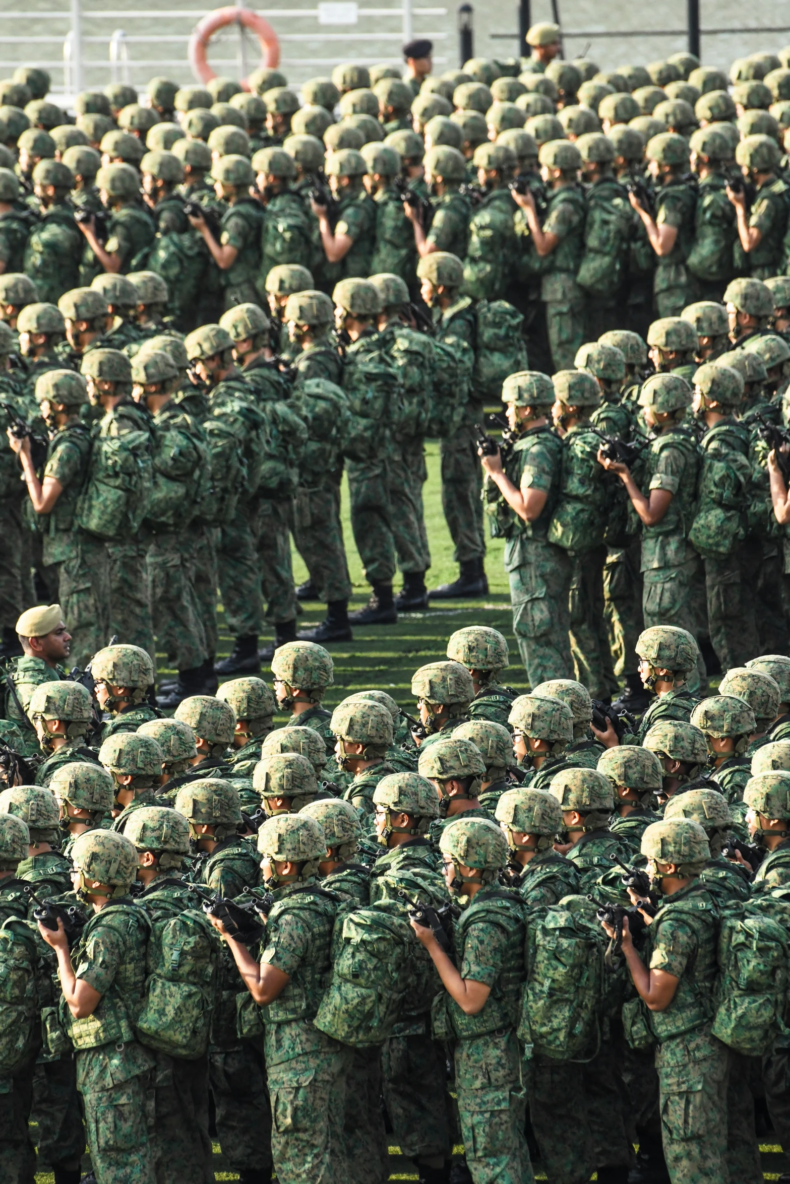 military parade taking place in the foreground