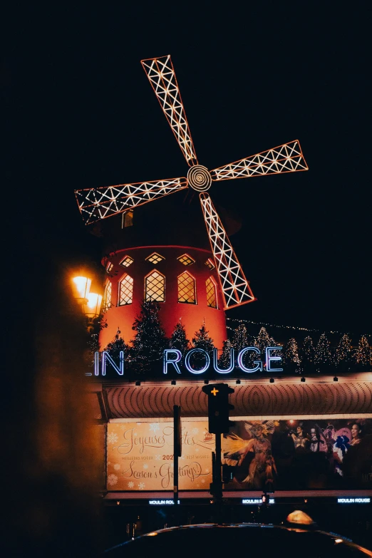 a large windmill on top of a building