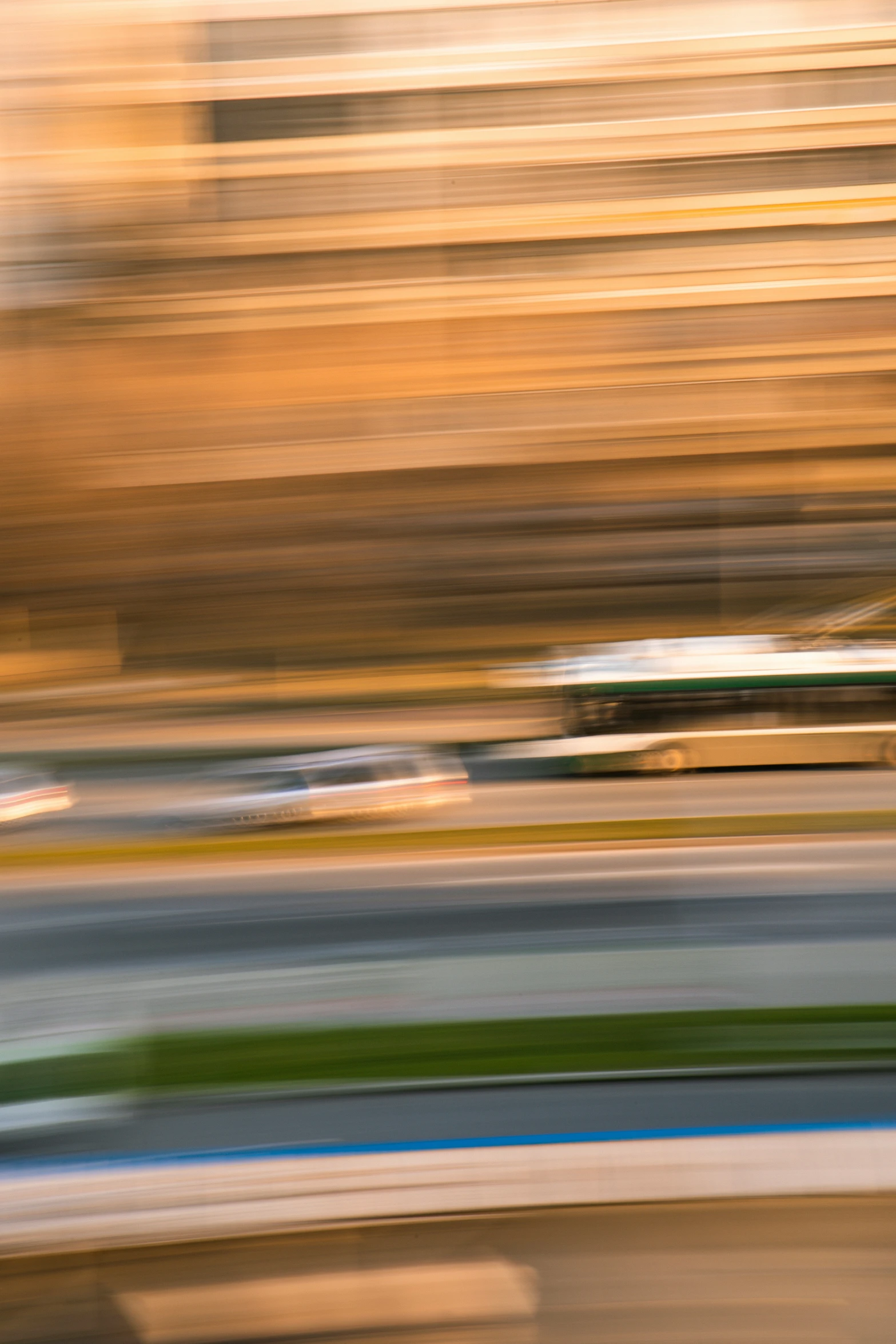 a bus driving down the street in motion