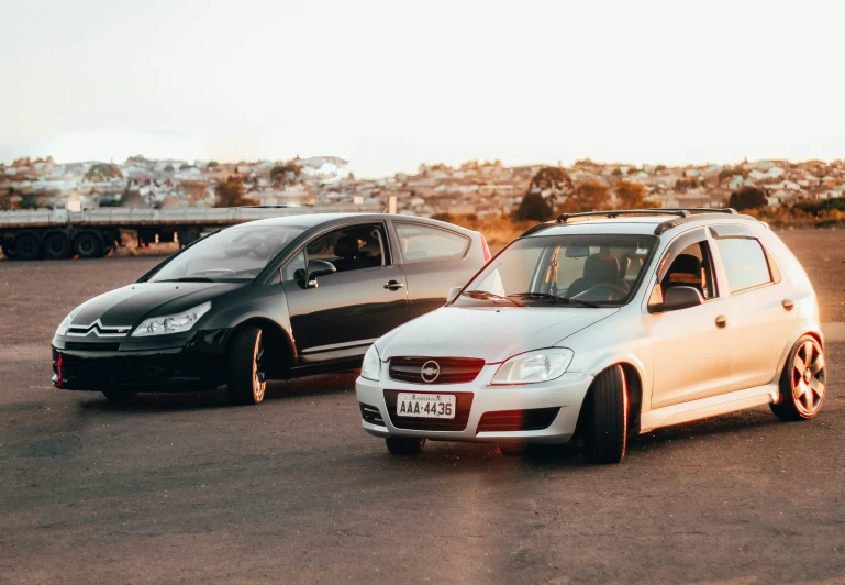 a couple of cars parked in a parking lot