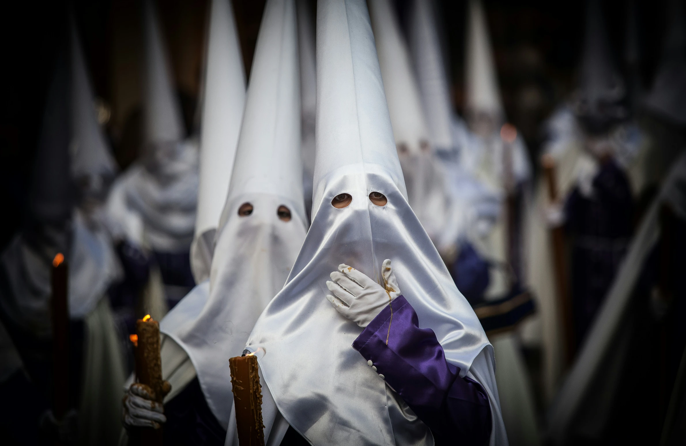 a group of people dressed as ghostly characters