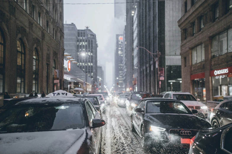 a very busy city street filled with lots of traffic