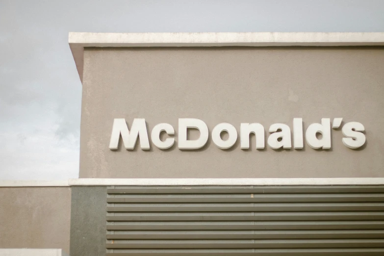 a sign that says mcdonalds above the entrance
