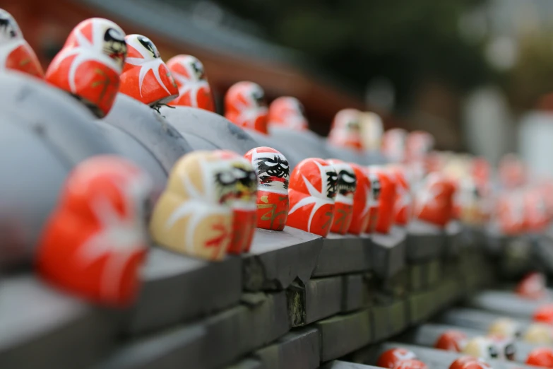 many chinese red and white items in a display