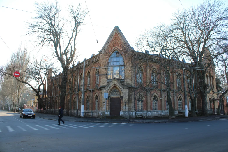 a large brick church in the middle of town