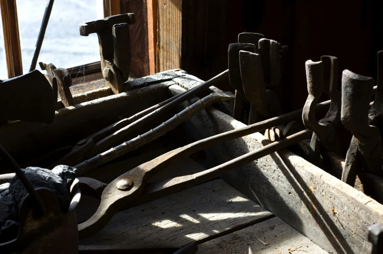 a large number of tools are laying on the ground