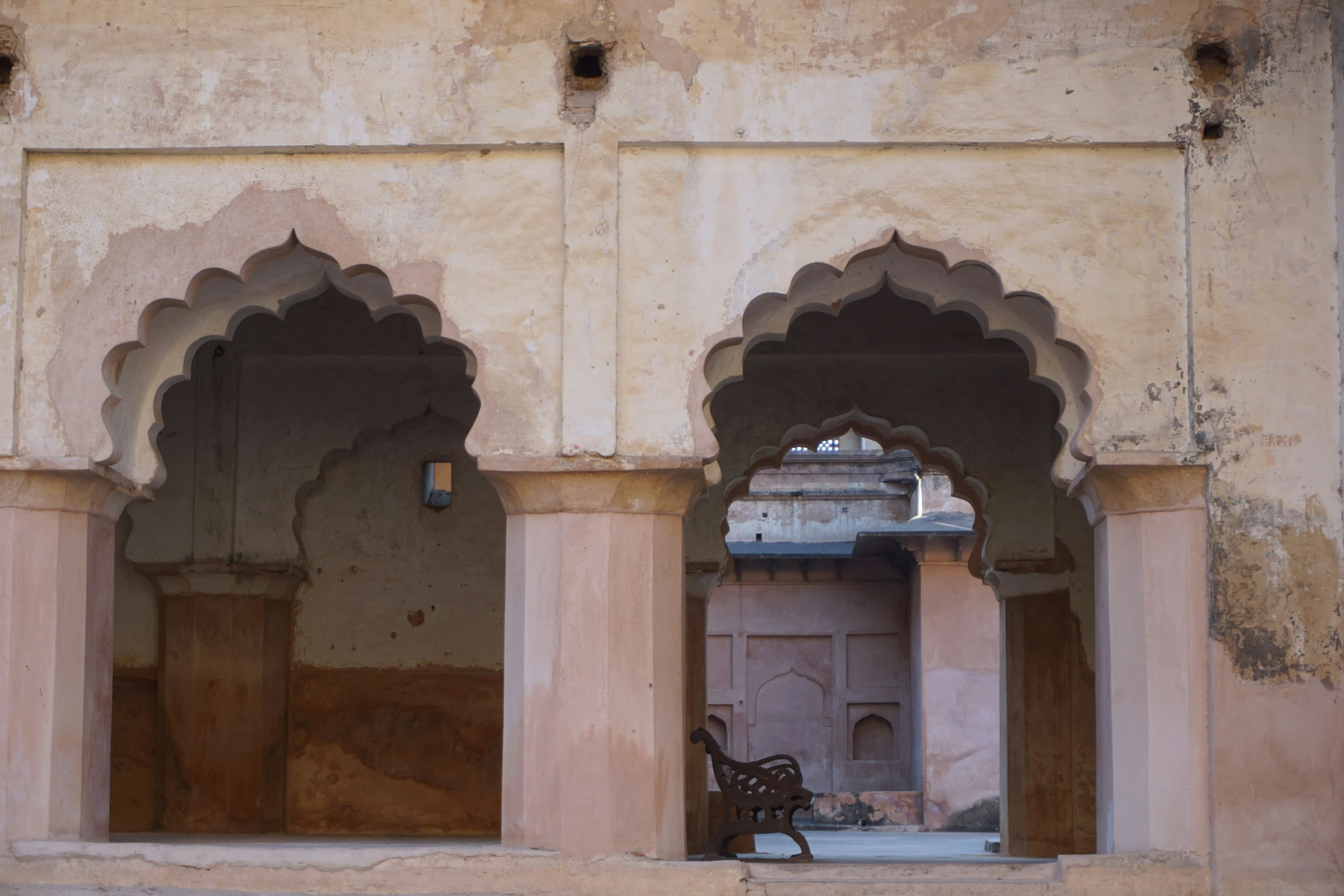 a view of an old building with several arches