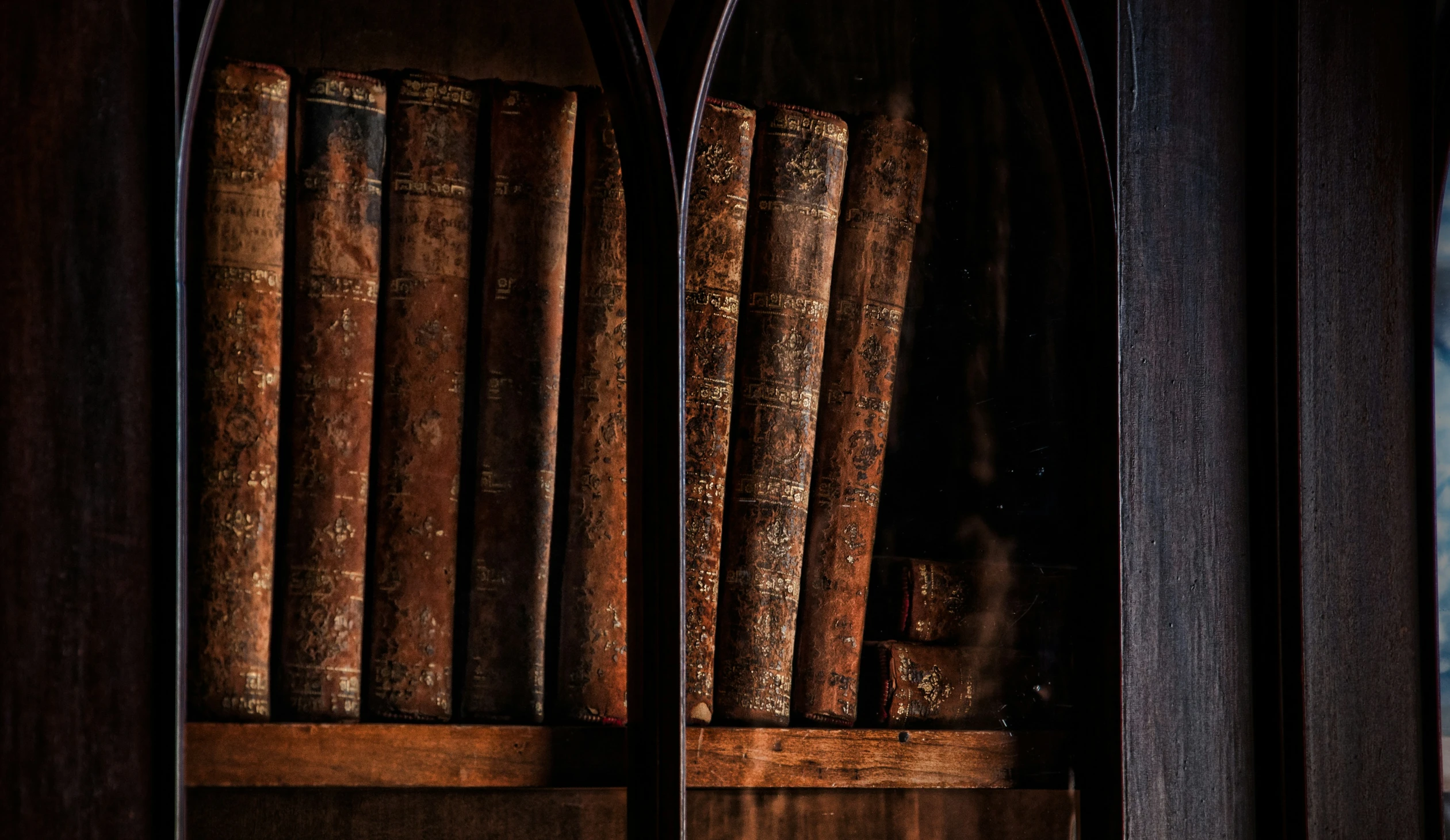 several bookshelves that have a book shelf with several books