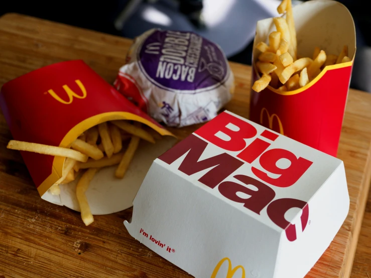 a sandwich and some fries on a table