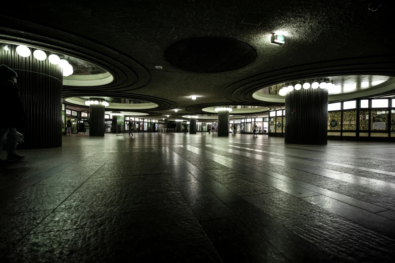 a empty hallway in an old building at night