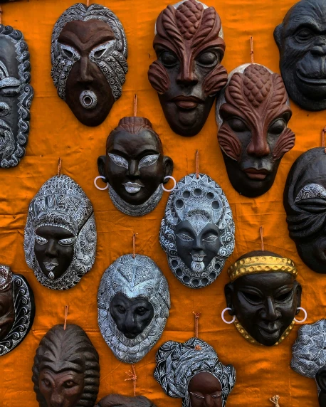 a variety of african masks are on display