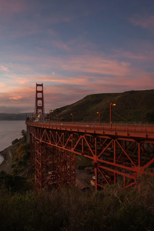 a bridge is shown that leads to the ocean